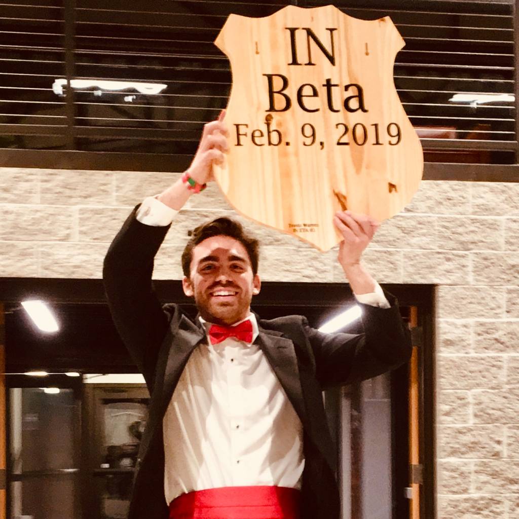 Nathan Sands with Chartering date plaque