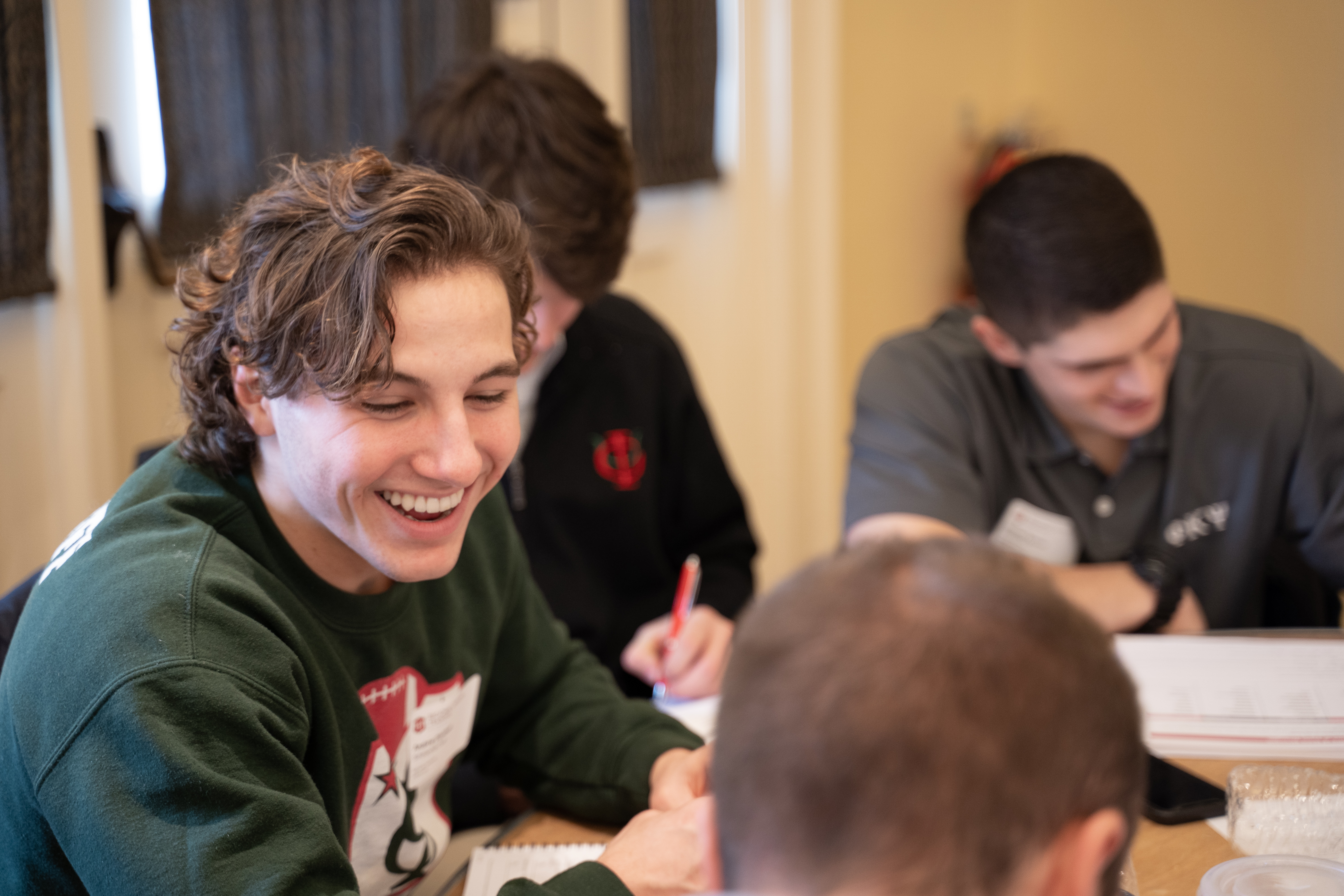 Member sitting at table